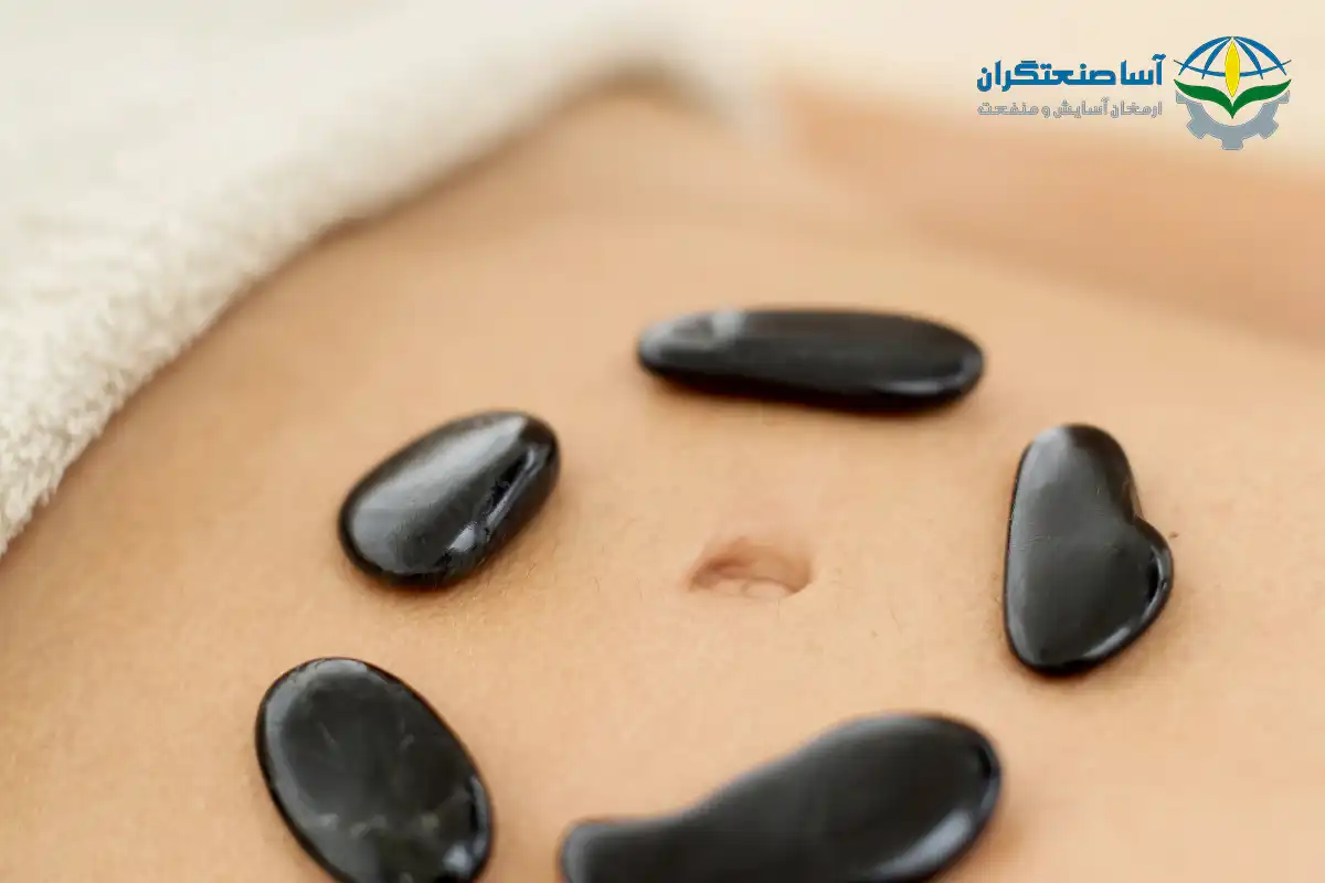 ماساژ روغن سیاه دانه در ناف
